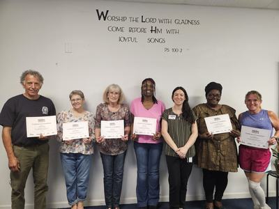 Participants with their completed certificates
