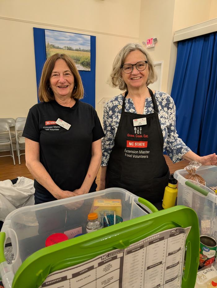 Extension Food Volunteers help at Hurricane Preparedness event.
