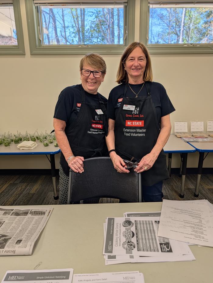Volunteers during a Home Cooking Club event at library