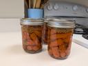 Homemade pickles in jar.