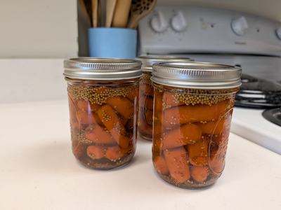 Homemade pickles in jar.