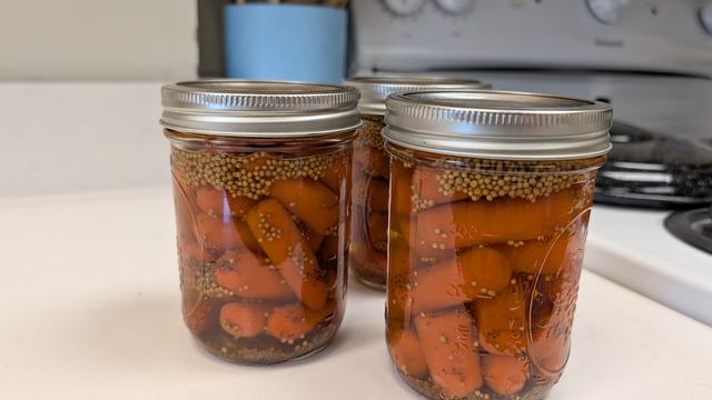 Homemade pickles in jar.