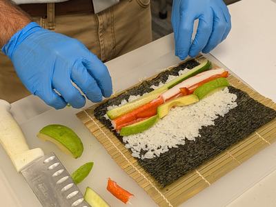 Sushi being made in class.