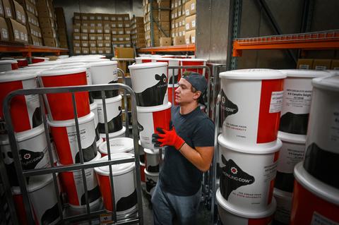 An undergraduate student  works in the Robert H. Feldmeier Dairy Processing Lab.