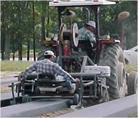Tractor laying plastic mulch