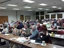 large room full of workshop attendees