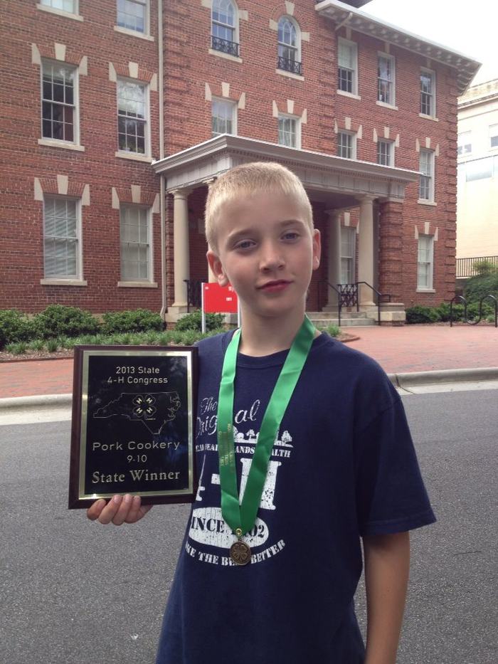 2013 - Swain County 4-Her, Travis Franklin wins first place at State 4-H Congress in the 9-10 year old division of the Pork Char Grill competition.
