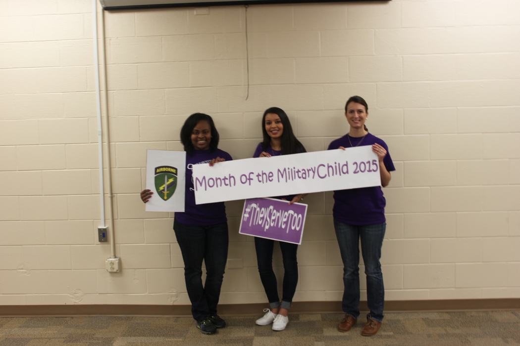 Kim W., Danielle P., & Amanda N. with Army Reserves CYSS celebrate MOMC & Purple UP! Day 