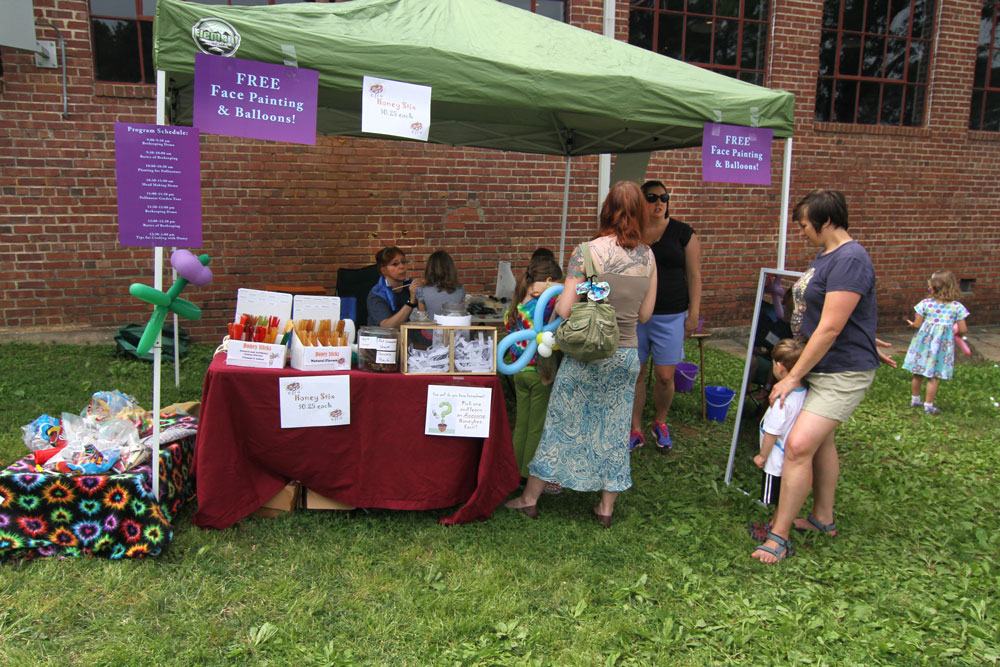 The kids enjoy pollinator games and face painting and balloons