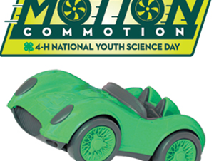 Green toy car under MOTION COMMOTION logo with "4-H National Youth Science Day" text