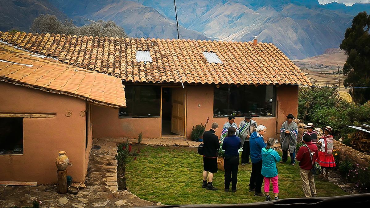 Community members interacting with tourists (Misminay, Cusco)