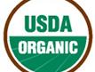 Circular USDA ORGANIC certification seal with green and brown colors