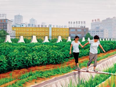Two people holding hands walking across a plank over an irrigation ditch beside green fields