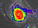 Satellite infrared view of a hurricane with a distinct eye near small Caribbean islands