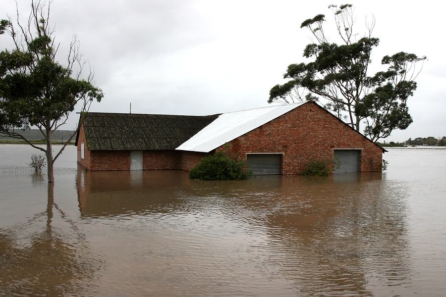 Flooded store room building with water half way up it's walls