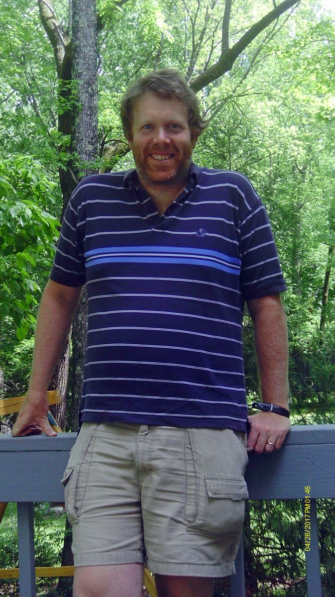 man standing outside 