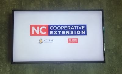 television on wall for signage