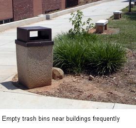 trash can in a landscaped area