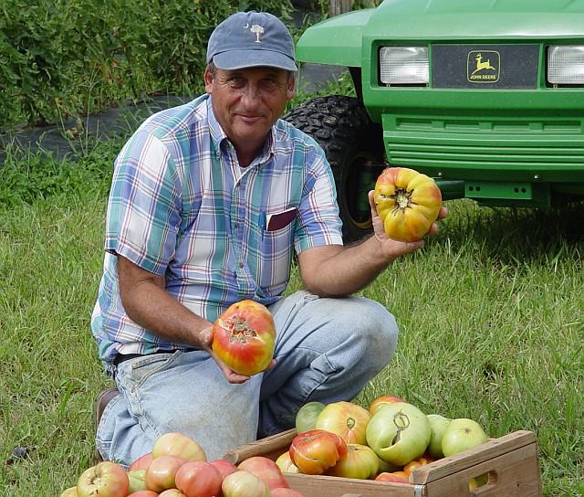 Randy Gardner with heirloom tomatoes