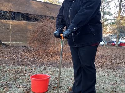 Virginia Lopez demonstrates how to take a proper soil sample with a soil probe.
