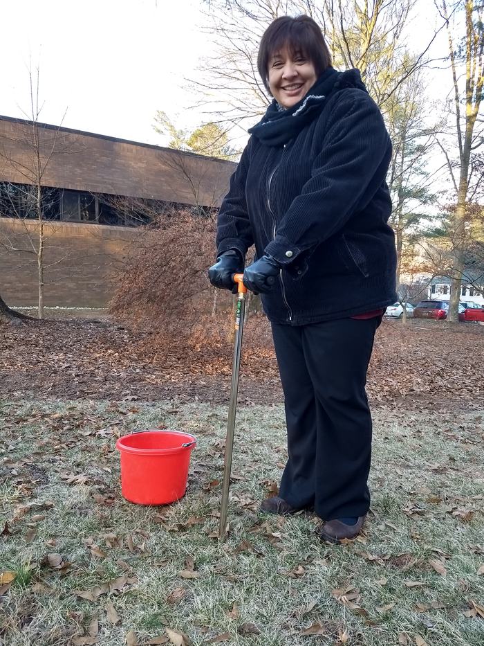  Virginia Lopez demonstrates how to take a proper soil sample with a soil probe.