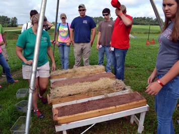 Studying the practice of soil erosion control. Students devise their own methods for protecting the soil from running off into the waterways