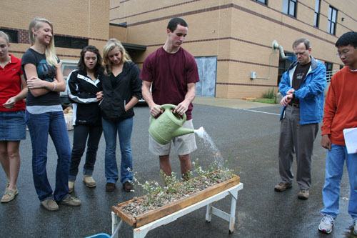Students raining on their rainboxes.