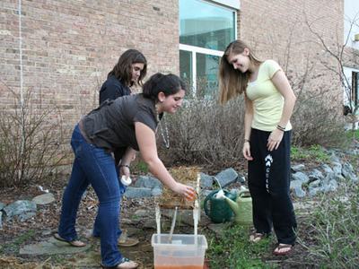Students making their own erosion control methods