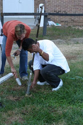 Students augering to determine their school soil types