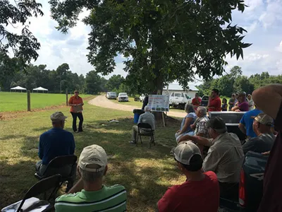 Image of people in field