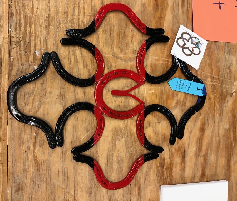 Winning artwork: cross made from horse shoes