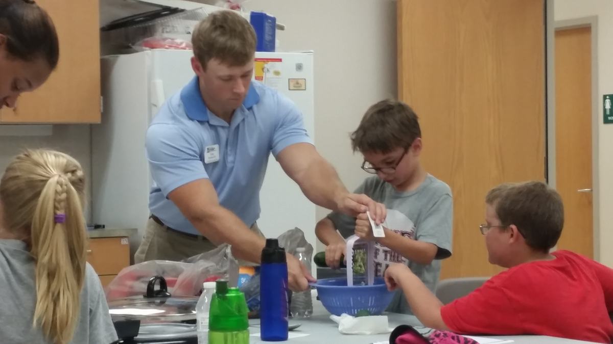 Harnett County FCS Agent, Greg Huneycutt teaching food safety to 4-H members.