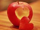 apple with a heart shaped piece cut out