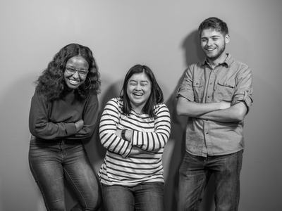 Photo of three co-hosts. Left to right: Nyawira Nyota, Sam Chan, Luke Shealy