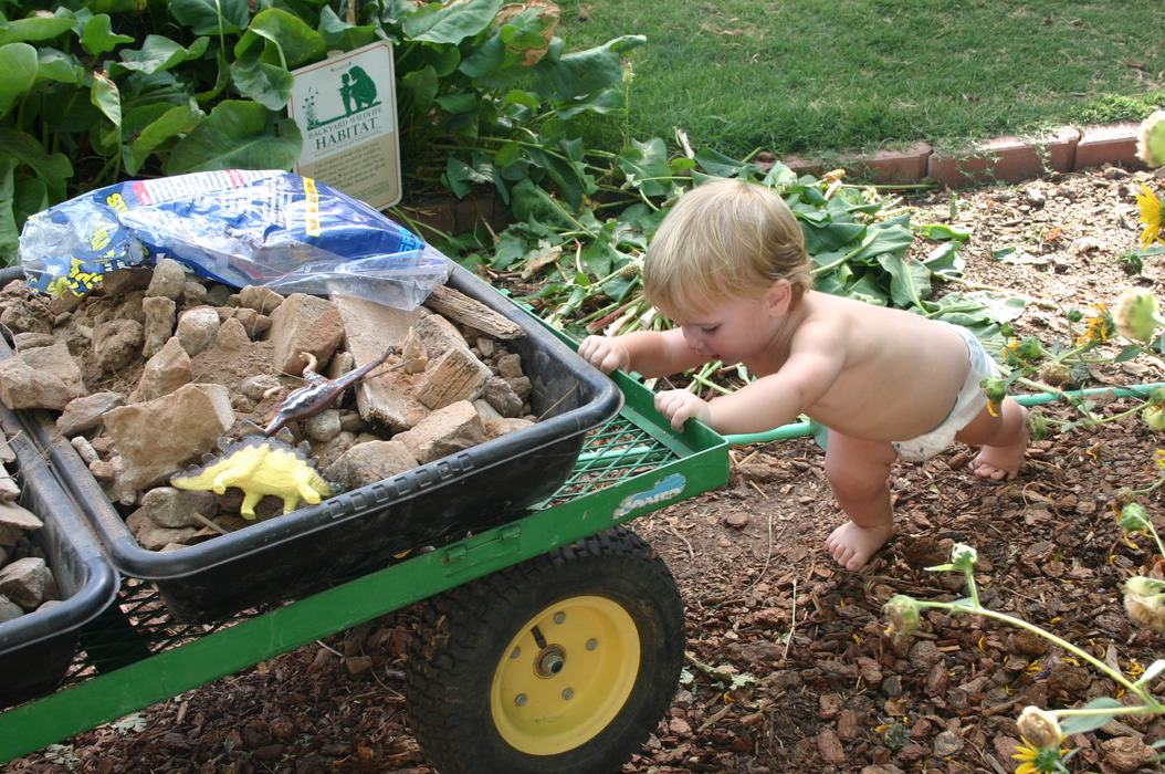 Toddler Wearing only a Diaper in the Garden
