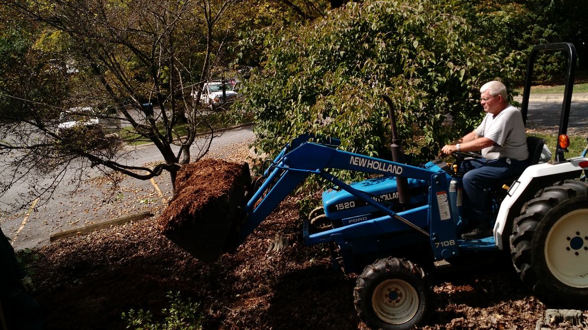 Greg Shell puts out hardwood mulch at the Caldwell Agricultural Center. 