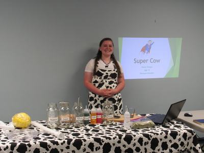 Club member Haley Hargus gives a presentation at the county level