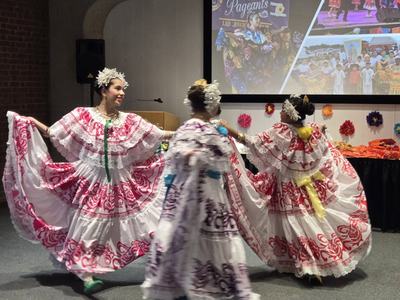 girls dancing in historical latin costumes