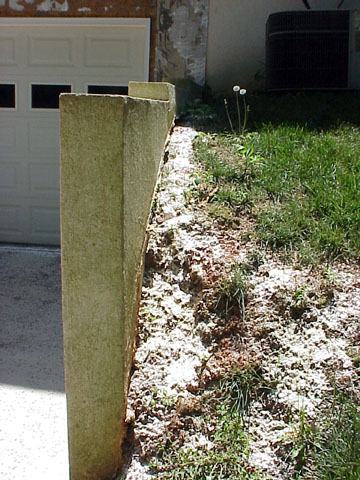 insecticidal dust on soil surface near wall