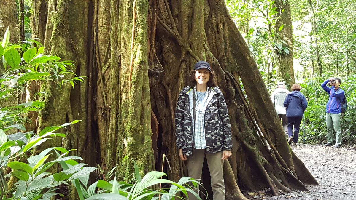 women standing by a tree in Costa Rica