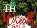 Nash County 4‑H logo with green clover and text "Holiday Wreath SALE" over evergreen branches