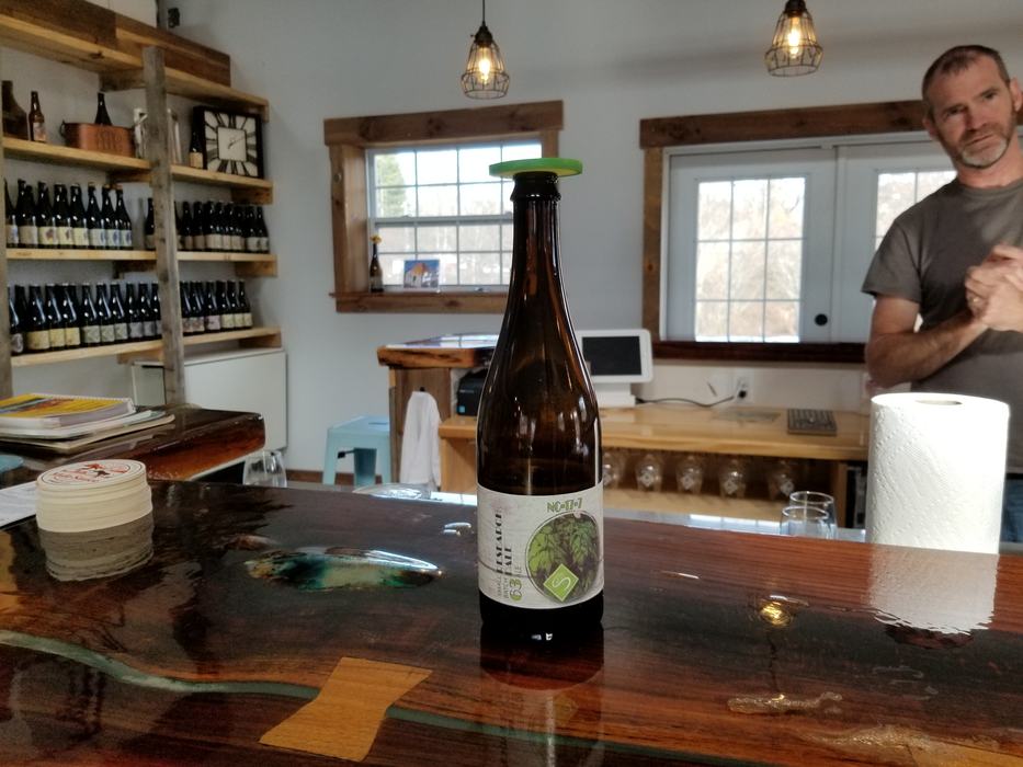 Man with beer bottle