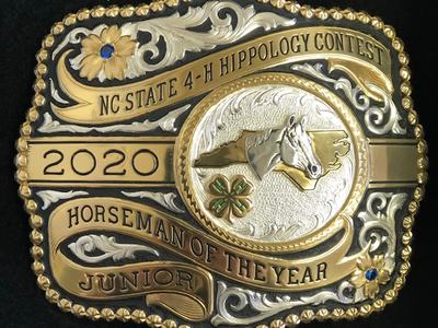 Belt buckle reading NC State 4-H Hippology Contest, 2020, Horseman of the Year, Junior.
