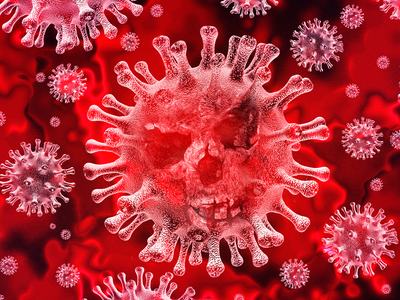 Red coronavirus-like particles floating, largest particle shows a faint skull pattern