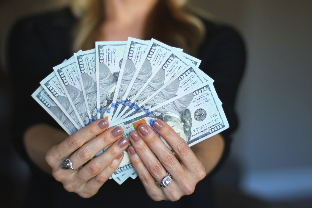 hand holding money