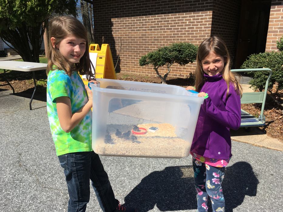 Alyssa and Airely with brooder box