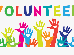 VOLUNTEER text above raised multicolored hands with heart symbols on their palms