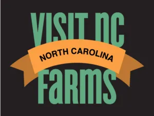 VISIT NC FARMS logo with orange banner reading NORTH CAROLINA