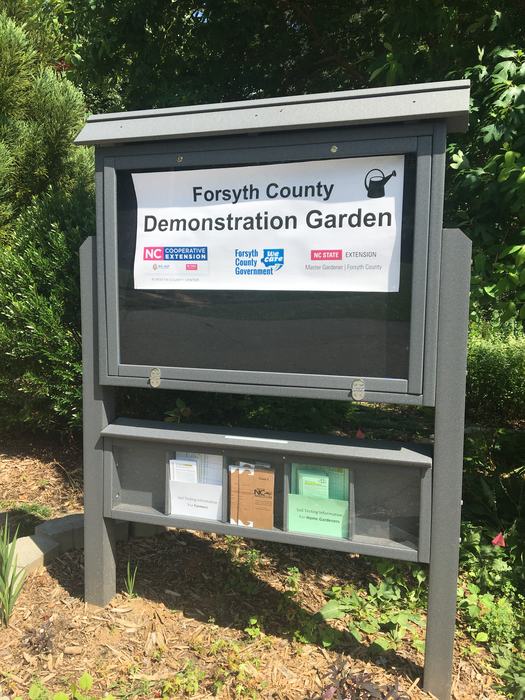 Demo Garden sign with soil test kits