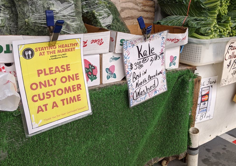 Sign asking customers to order one at a time. 